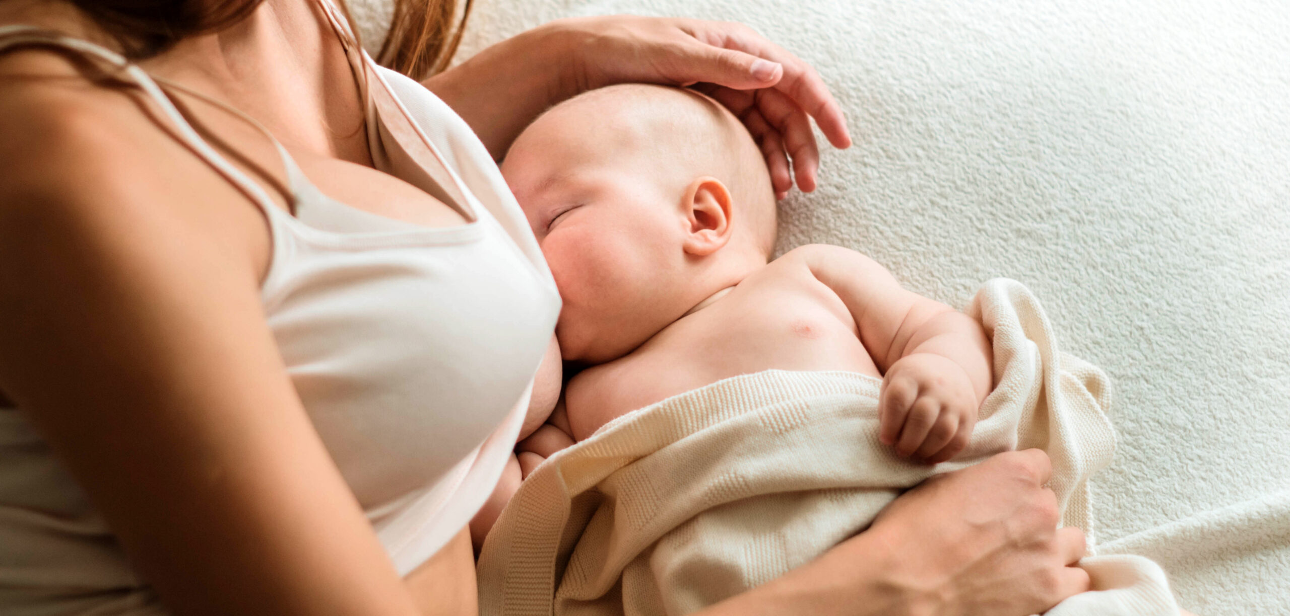 mom-breastfeeding-her-baby-scaled